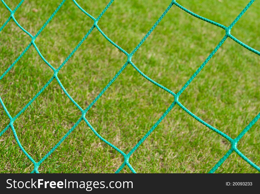 Net soccer goal against the stadium turf. Net soccer goal against the stadium turf