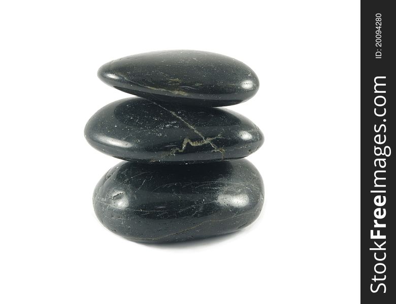 Three spa black stones closeup. Three spa black stones closeup