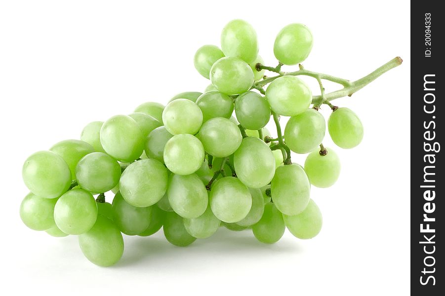 Branch of ripe green grapes isolated on white background