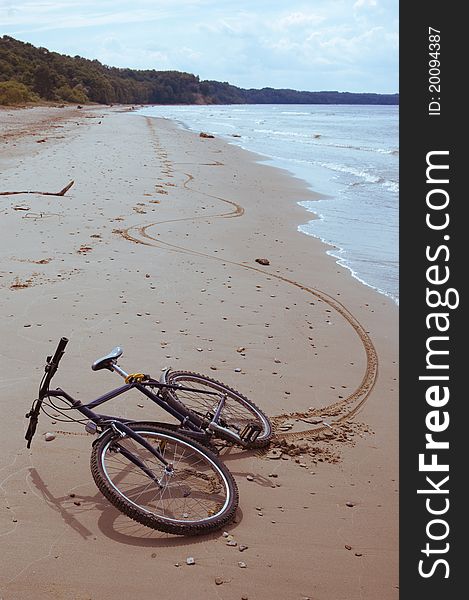 Riding a bicycle on beach. Riding a bicycle on beach