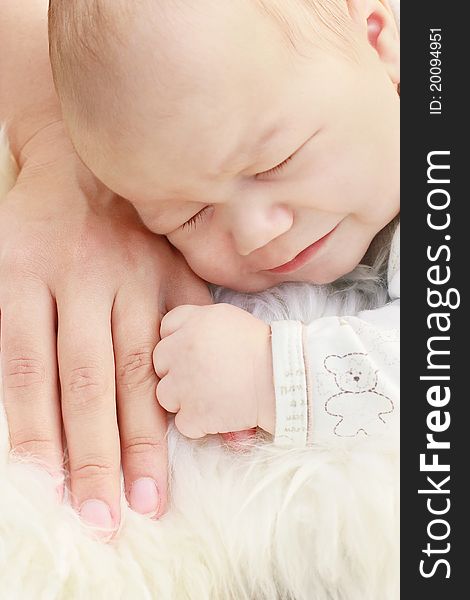 Close-up Of Cute Small Boy With Mother Hand