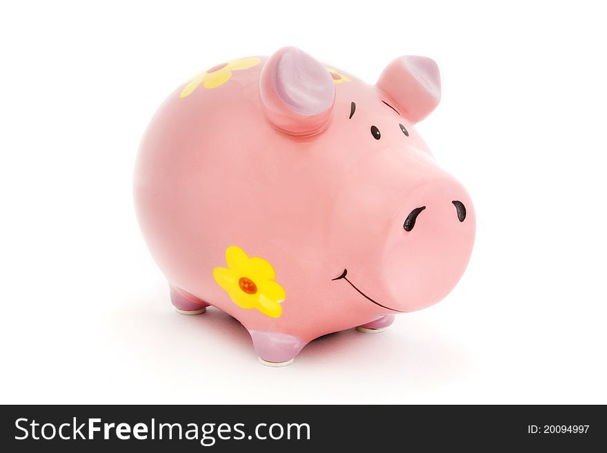 Pink Piggy bank with yellow flowers on white