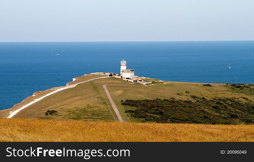 View across the South Downs to Belle Toute lighthouse. View across the South Downs to Belle Toute lighthouse