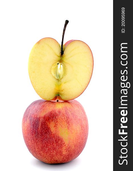 Isolated apples, one full and one sliced. Isolated apples, one full and one sliced