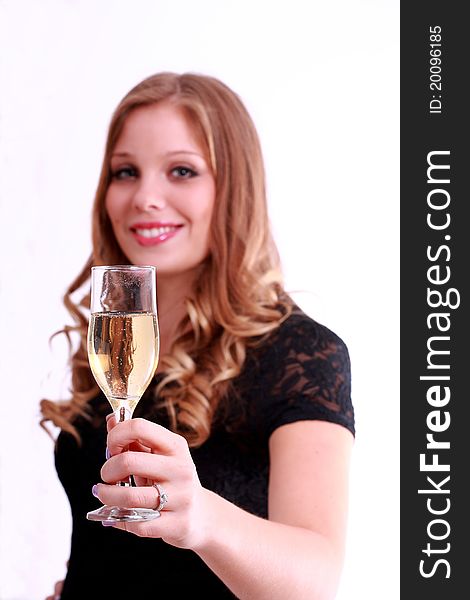 A woman holding a champagne flute. A woman holding a champagne flute