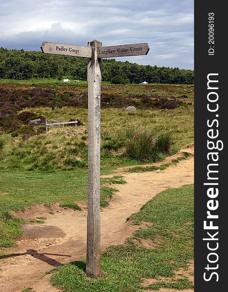 A directional sign post in Padley Gorge, Derbyshire. A directional sign post in Padley Gorge, Derbyshire