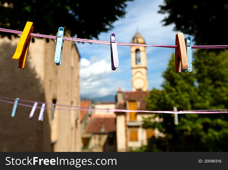 Clothes Pegs On Clothes Line With Church