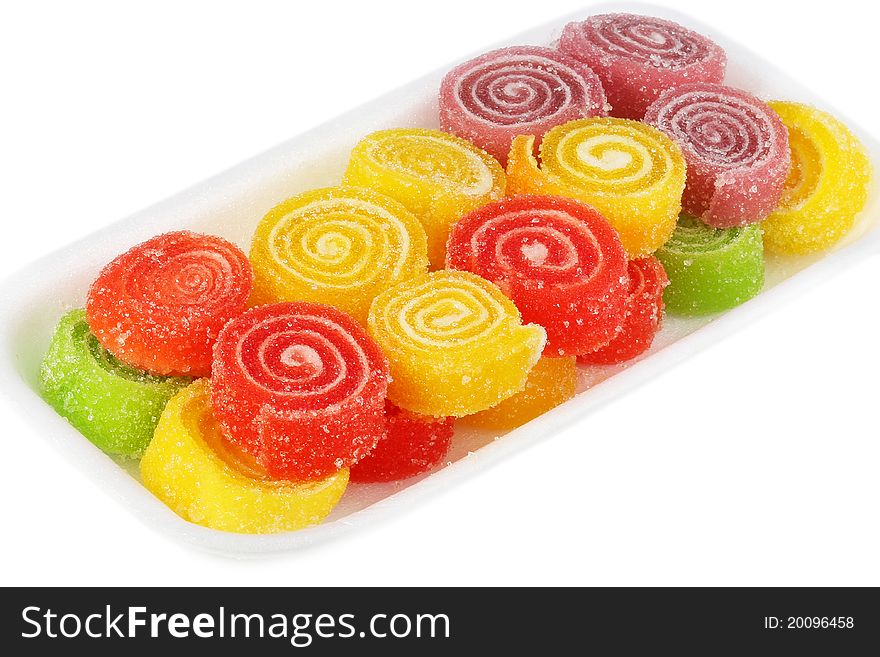 Colorful jelly in sugar isolated on white