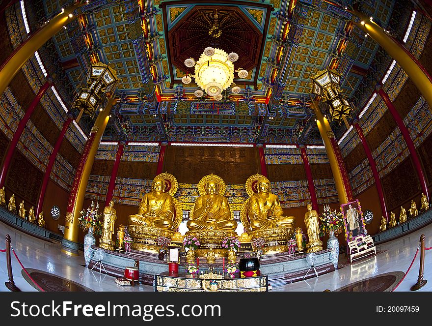 Golden three Buddha statues in Chinese Temple