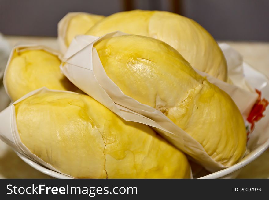 Close up of peeled durian with paper wrap. Close up of peeled durian with paper wrap