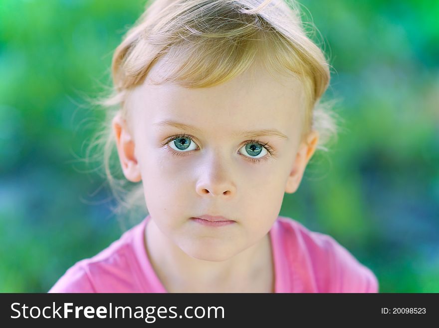 The little girl looked at us a serious adult eyes. The little girl looked at us a serious adult eyes