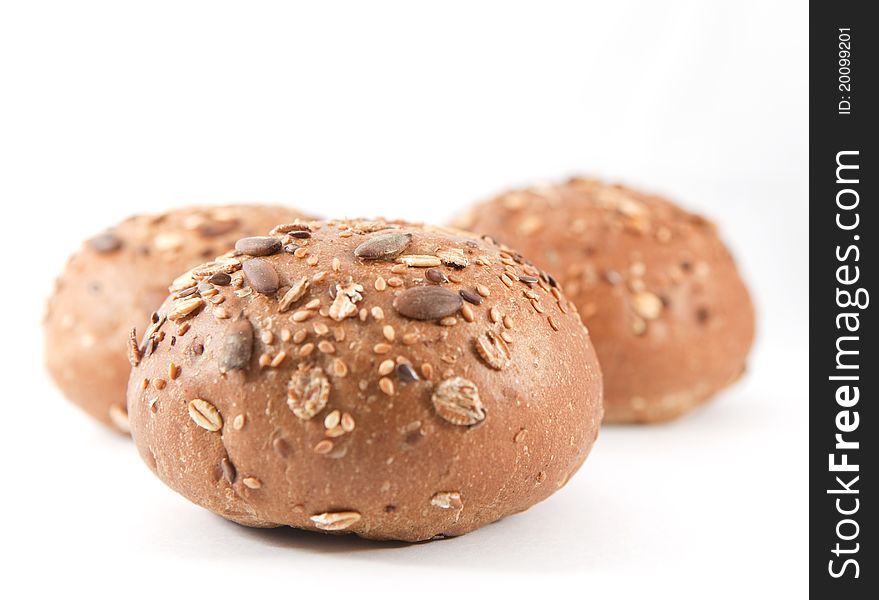 Seeds roll. Two buns on the white background. Seeds roll. Two buns on the white background