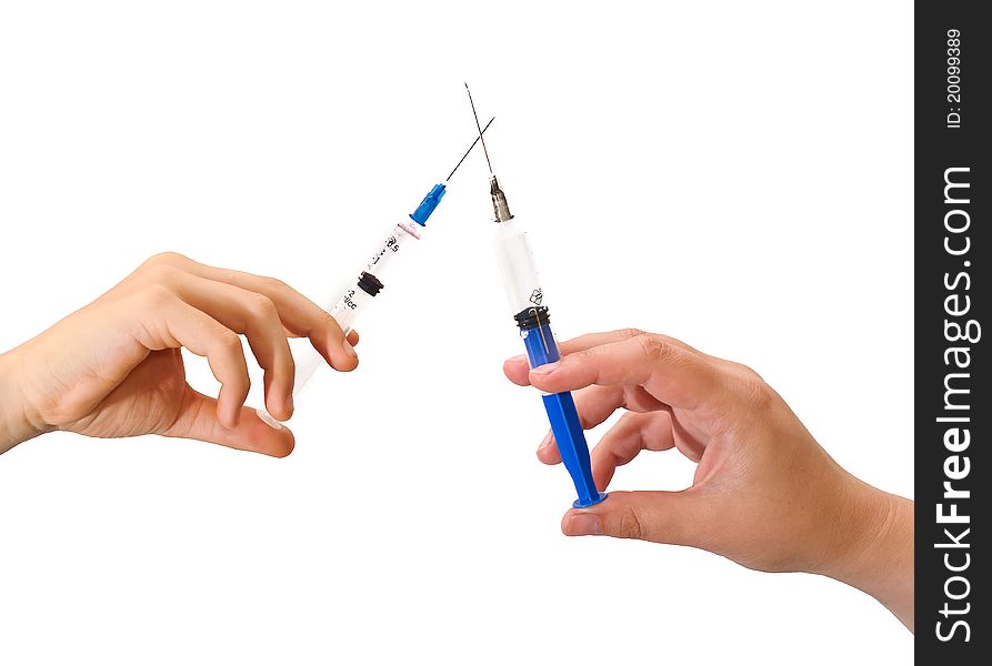 Hand with a syringe. Isolated on white background