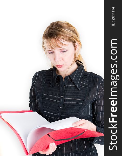 An  attractive woman browsing through a red folder. An  attractive woman browsing through a red folder