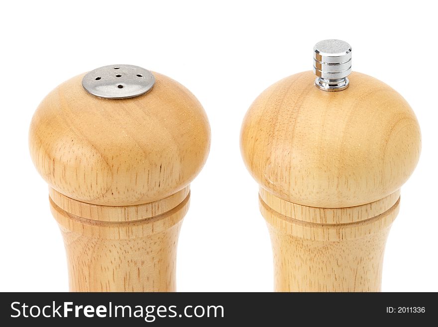 Tops of salt shaker and pepper grinder. Tops of salt shaker and pepper grinder