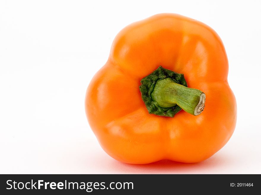 Top of orange bell pepper. Top of orange bell pepper