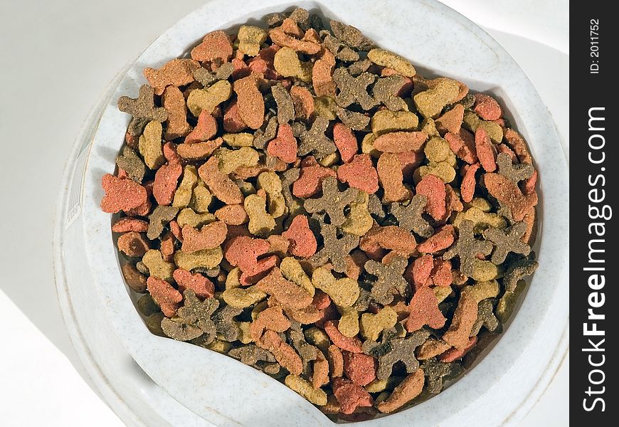 A bowl full of cat food