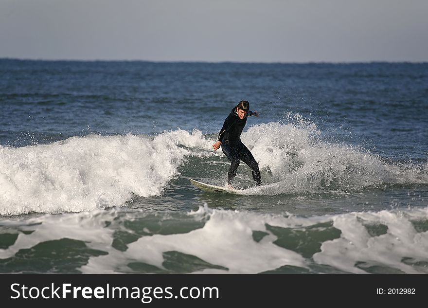 Surfer Making A Forehand Cutback