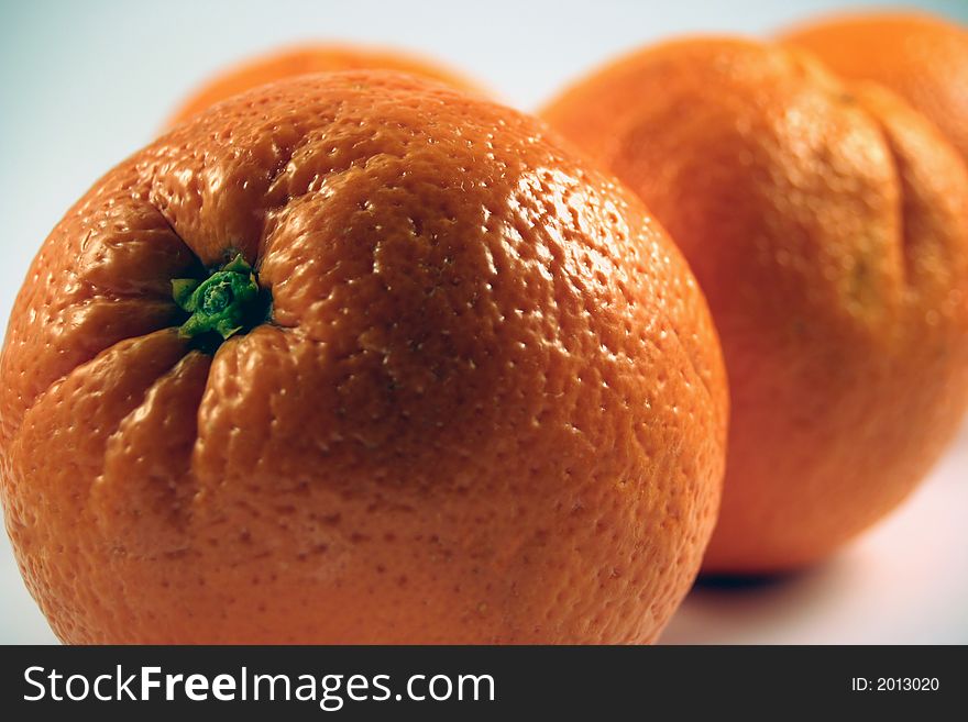 Oranges close up on a white background