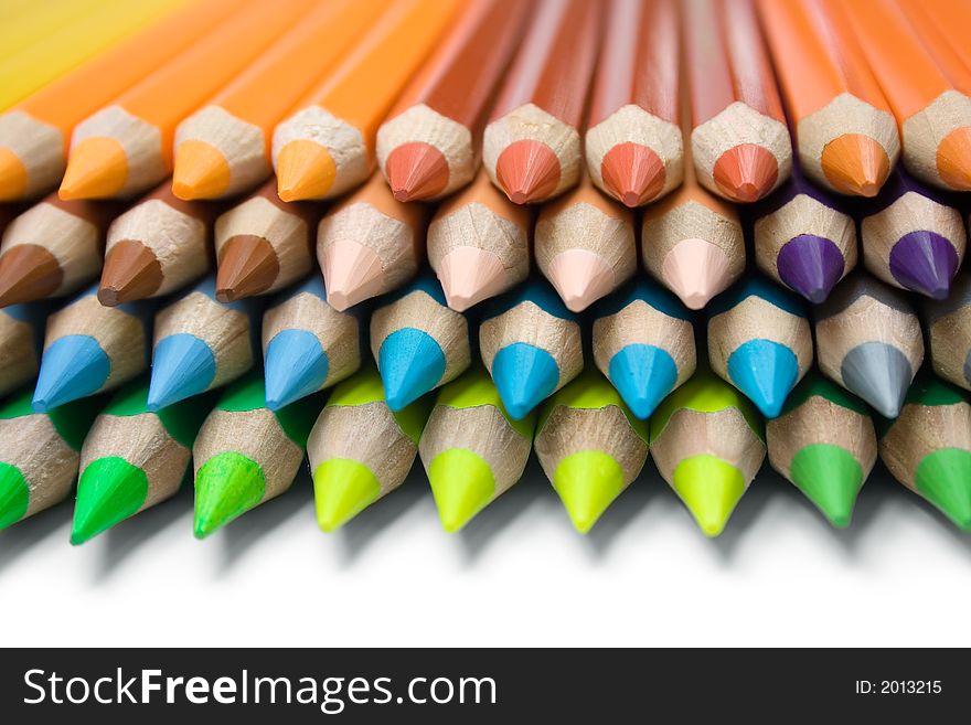 Stack of colorful pencils isolated on a white background. Stack of colorful pencils isolated on a white background.