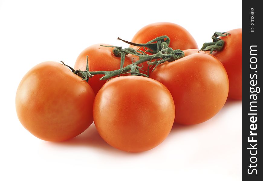 Red ripe tomatoes over a white background. Red ripe tomatoes over a white background