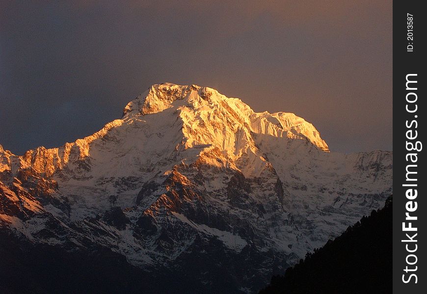 Sunrise by Annapurna South in Nepal. Sunrise by Annapurna South in Nepal