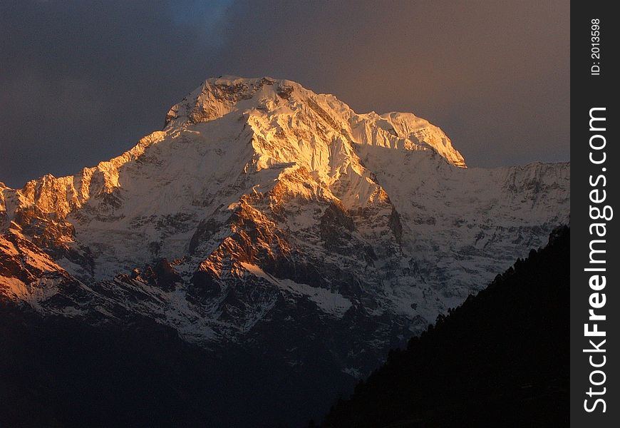 Sunrise by Annapurna South in Nepal. Sunrise by Annapurna South in Nepal