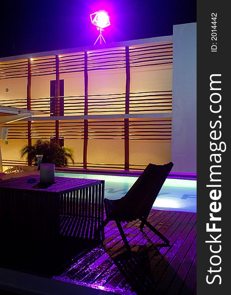 Inner patio with the swimming pool in a hotel with modern and minimalism decoration in Playa del Carmen, Cancun, Mexico, Latin America. Inner patio with the swimming pool in a hotel with modern and minimalism decoration in Playa del Carmen, Cancun, Mexico, Latin America