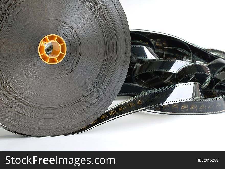 Roll of cinema film on white background. Roll of cinema film on white background