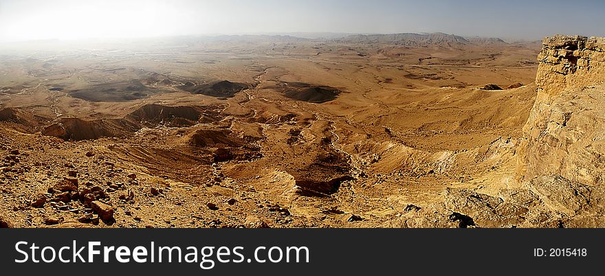 Panoramic view on desert and Ramon Crater in south Israel. Panoramic view on desert and Ramon Crater in south Israel.