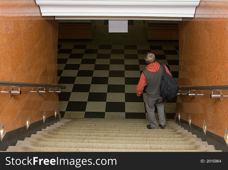 Man at Moscow subway. Come down to subway station. Man at Moscow subway. Come down to subway station.