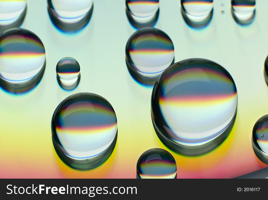 Water drops on compact disc close up