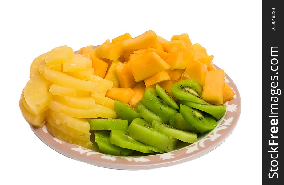 Isolated tray of Kiwi, Pineapple and cantaloupe. Isolated tray of Kiwi, Pineapple and cantaloupe