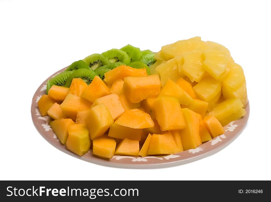 Isolated tray of Kiwi, Pineapple and cantaloupe. Isolated tray of Kiwi, Pineapple and cantaloupe