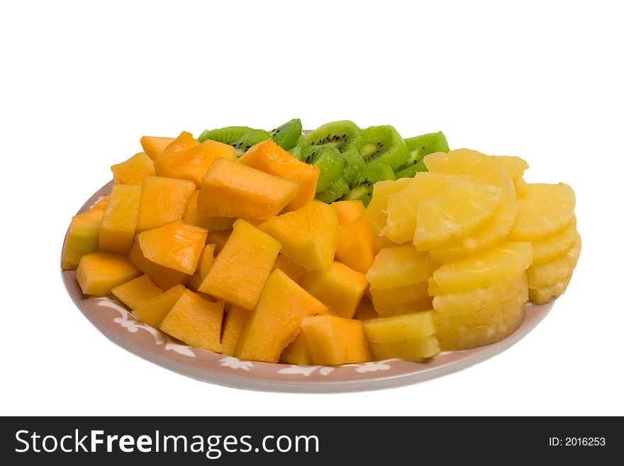 Isolated tray of Kiwi, Pineapple and cantaloupe. Isolated tray of Kiwi, Pineapple and cantaloupe