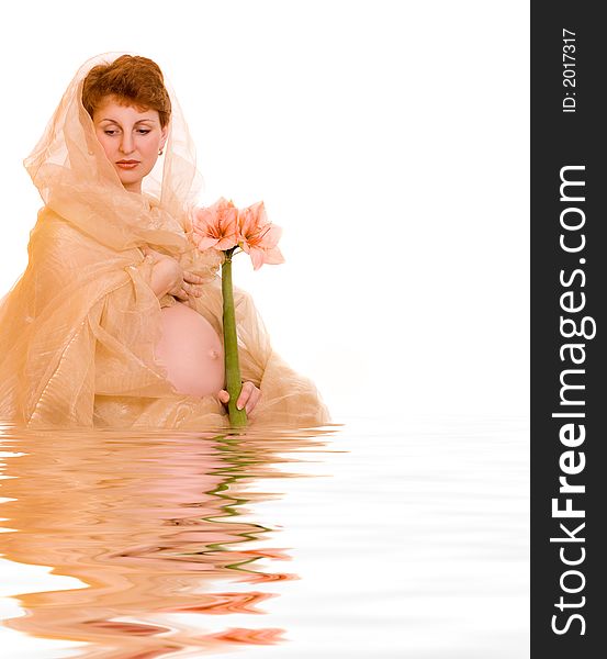 Picture of a Beautiful young pregnant woman with flower in rendered water