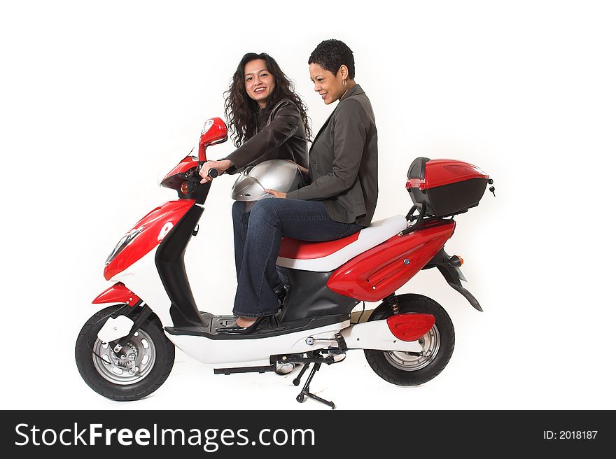 Couple girls talking on  scooter over white background