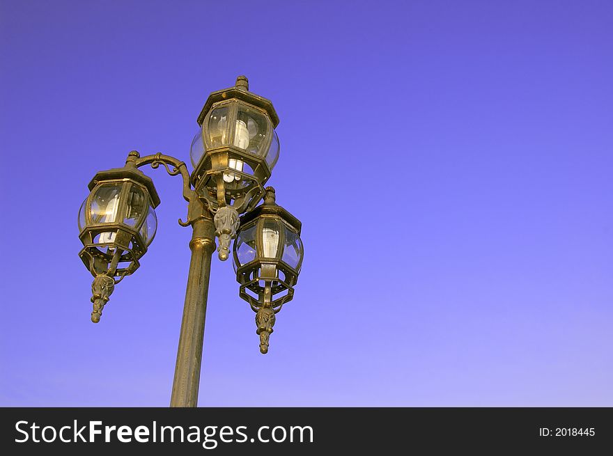 Lamp post under the blue sky