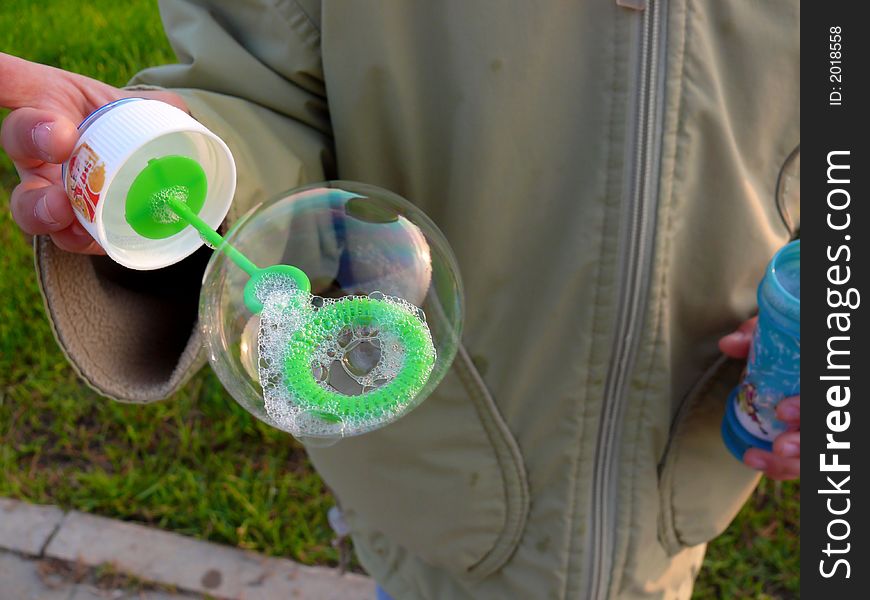 Sunset bubbles... Girl blow soap bubbles, very happy time. Sunset bubbles... Girl blow soap bubbles, very happy time...