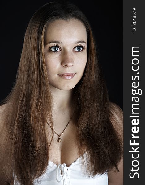 Girl in white dress on black background. Girl in white dress on black background