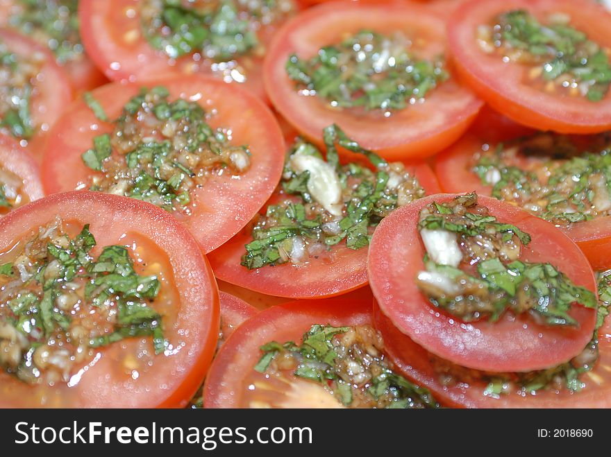 Fresh vegetable salad with tomatoes, basil and garlic. Fresh vegetable salad with tomatoes, basil and garlic