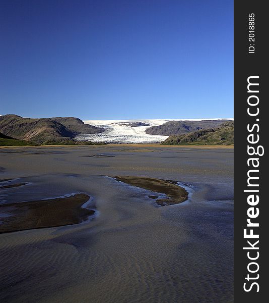 View over the water to the glacier