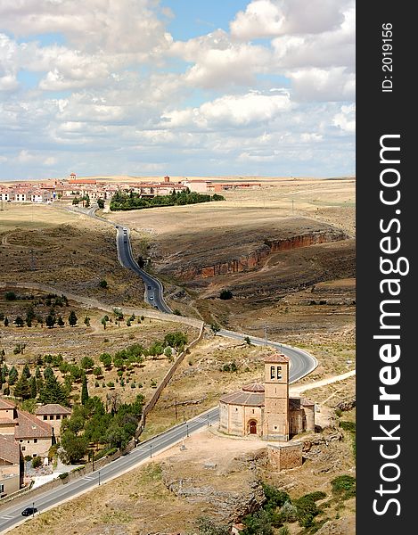General sight from Segovia (Spain) with winding road and the Church of Vera Cruz. General sight from Segovia (Spain) with winding road and the Church of Vera Cruz.