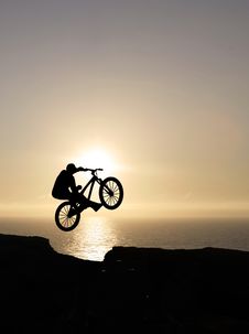 Sunset Biker Jumping Royalty Free Stock Images Sunset Biker Jumping Royalty Free Stock Images