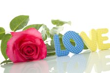 Red Rose And The Text Of LOVE Stock Images Red Rose And The Text Of LOVE Stock Images