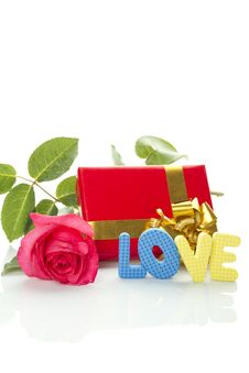 Red Rose, Gift Box And The Text LOVE Royalty Free Stock Images Red Rose, Gift Box And The Text LOVE Royalty Free Stock Images