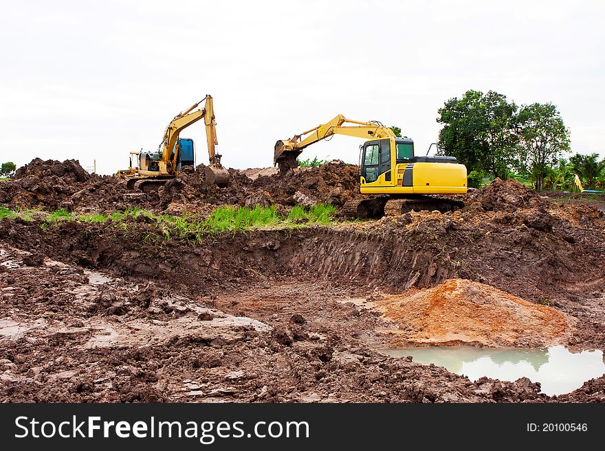 Excavators digging the soil are quite