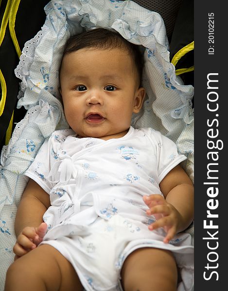 Portrait of Thai baby looking at camera