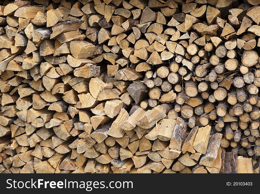 Stacked firewood of birch and pine