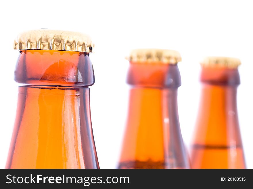 Three beer bottles isolated on white